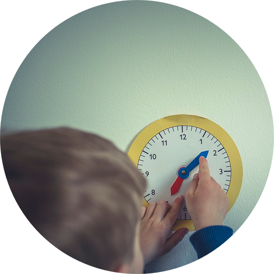 A boy measuring time